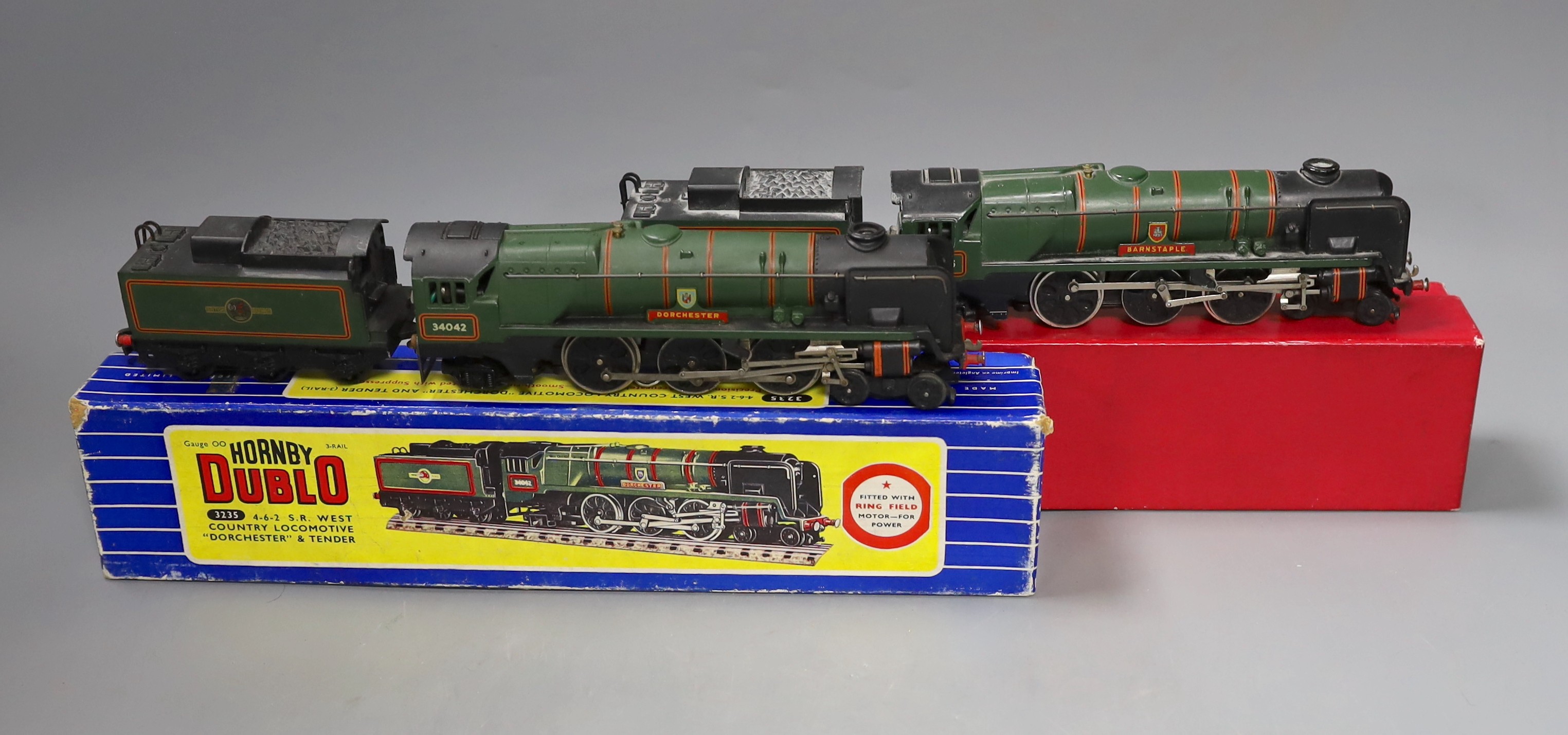 Two Hornby Dublo locomotives and tenders – 3235 4-6-2 S.R. West Country locomotive Dorchester and tender (3 rail) and 2335 4-6-2 West Country Barnstaple locomotive and tender